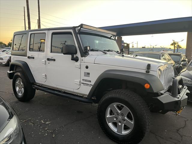 used 2013 Jeep Wrangler Unlimited car, priced at $15,995