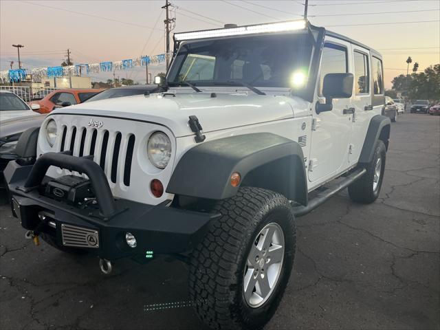 used 2013 Jeep Wrangler Unlimited car, priced at $15,995