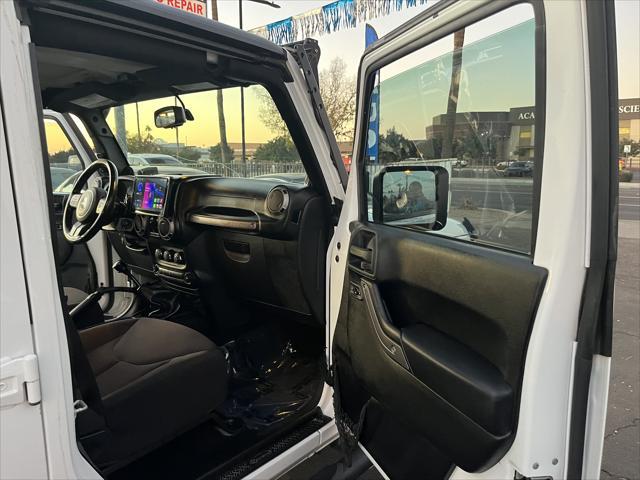 used 2013 Jeep Wrangler Unlimited car, priced at $15,995