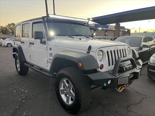 used 2013 Jeep Wrangler Unlimited car, priced at $15,995