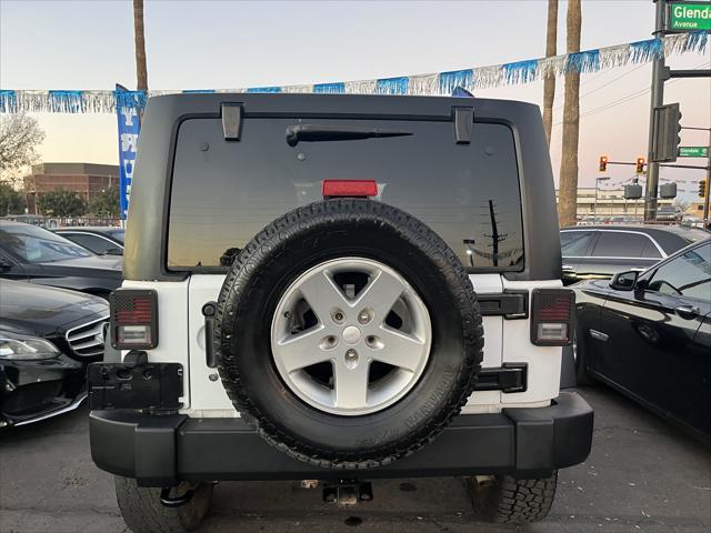 used 2013 Jeep Wrangler Unlimited car, priced at $15,995