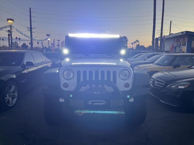 used 2013 Jeep Wrangler Unlimited car, priced at $15,995