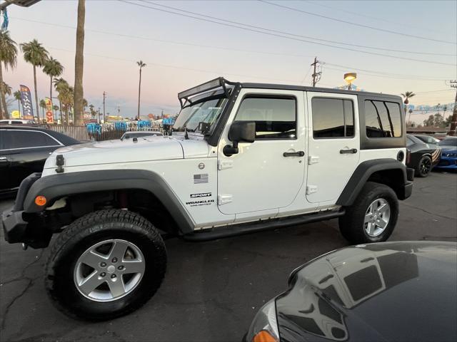 used 2013 Jeep Wrangler Unlimited car, priced at $15,995