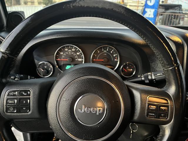 used 2013 Jeep Wrangler Unlimited car, priced at $15,995