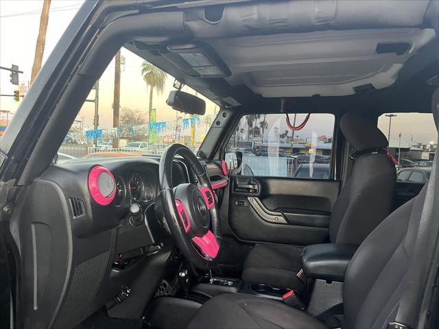 used 2014 Jeep Wrangler Unlimited car, priced at $16,995