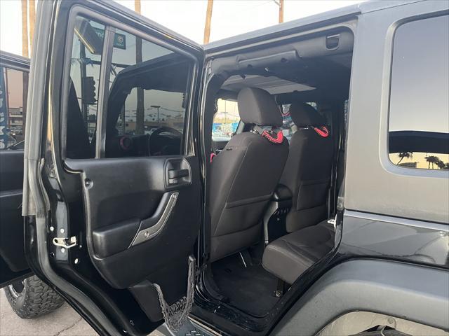 used 2014 Jeep Wrangler Unlimited car, priced at $16,995