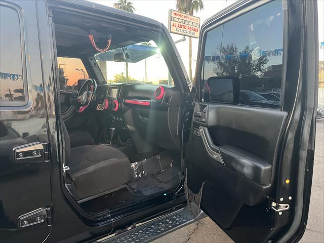 used 2014 Jeep Wrangler Unlimited car, priced at $16,995