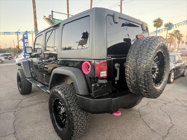 used 2014 Jeep Wrangler Unlimited car, priced at $16,995