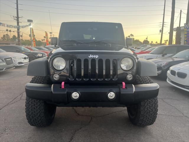 used 2014 Jeep Wrangler Unlimited car, priced at $16,995