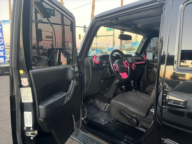 used 2014 Jeep Wrangler Unlimited car, priced at $16,995