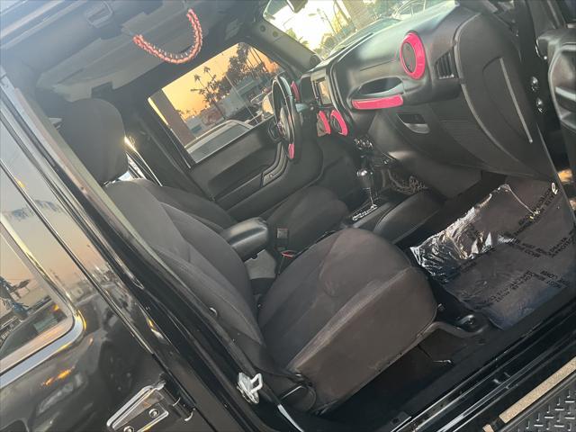 used 2014 Jeep Wrangler Unlimited car, priced at $16,995