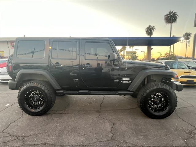 used 2014 Jeep Wrangler Unlimited car, priced at $16,995