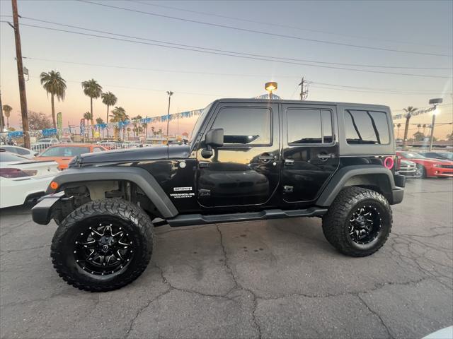 used 2014 Jeep Wrangler Unlimited car, priced at $16,995