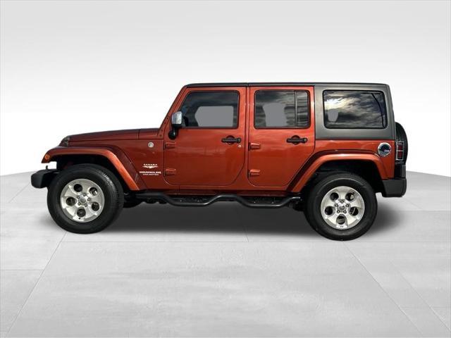 used 2014 Jeep Wrangler Unlimited car, priced at $15,711