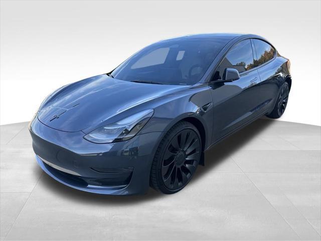 used 2023 Tesla Model 3 car, priced at $32,621