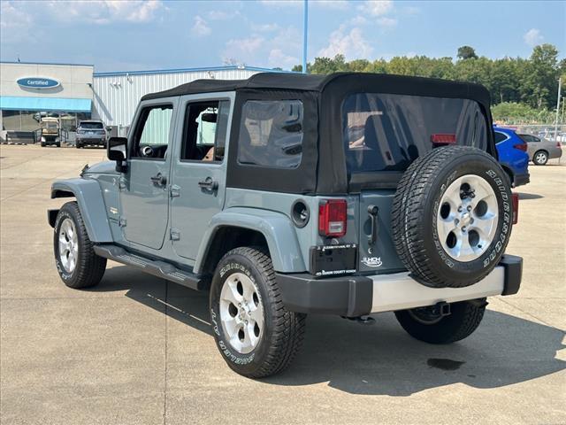 used 2015 Jeep Wrangler Unlimited car, priced at $24,115