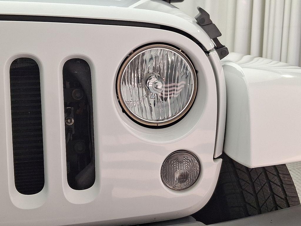 used 2015 Jeep Wrangler Unlimited car, priced at $19,994