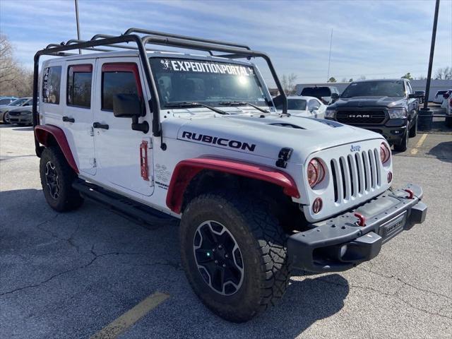 used 2014 Jeep Wrangler Unlimited car, priced at $24,800