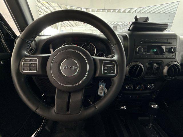 used 2015 Jeep Wrangler Unlimited car, priced at $15,000