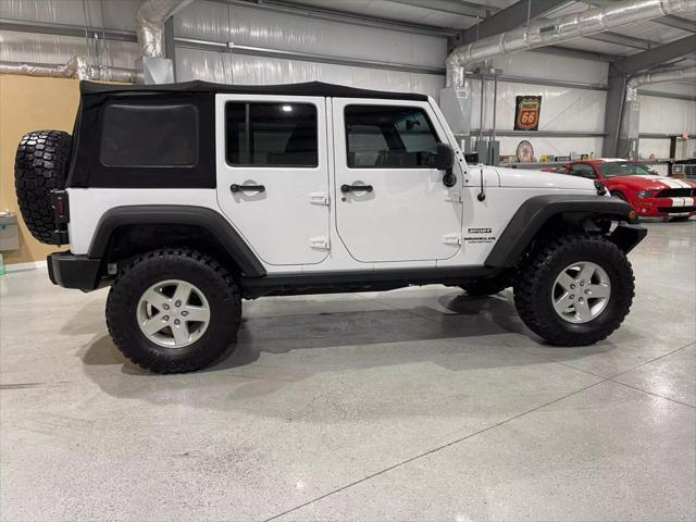 used 2013 Jeep Wrangler Unlimited car, priced at $14,900