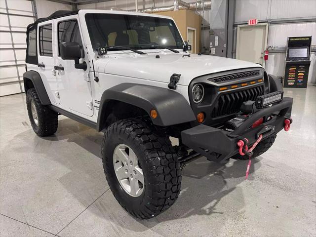 used 2013 Jeep Wrangler Unlimited car, priced at $14,900