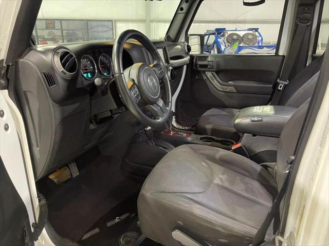 used 2013 Jeep Wrangler Unlimited car, priced at $14,900