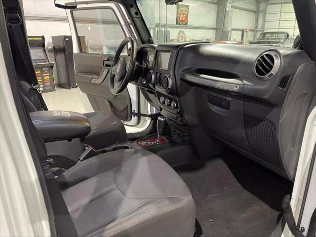 used 2013 Jeep Wrangler Unlimited car, priced at $14,900