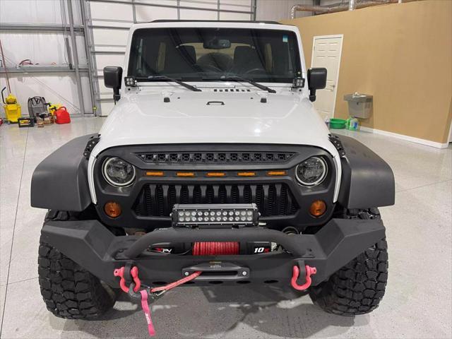 used 2013 Jeep Wrangler Unlimited car, priced at $14,900