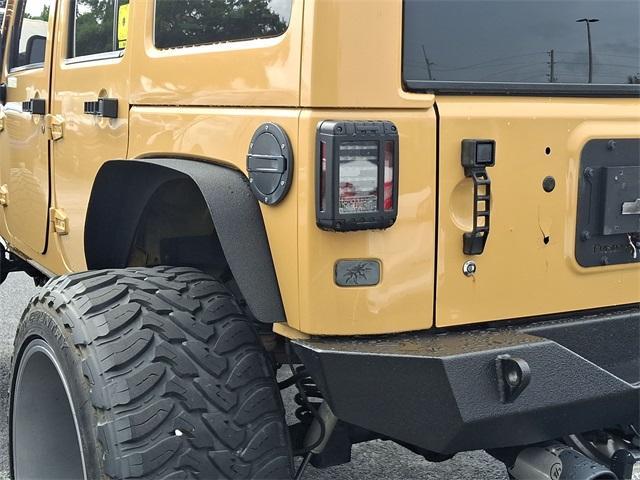 used 2013 Jeep Wrangler Unlimited car, priced at $17,977