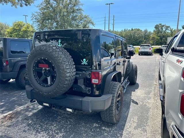 used 2014 Jeep Wrangler Unlimited car, priced at $15,977