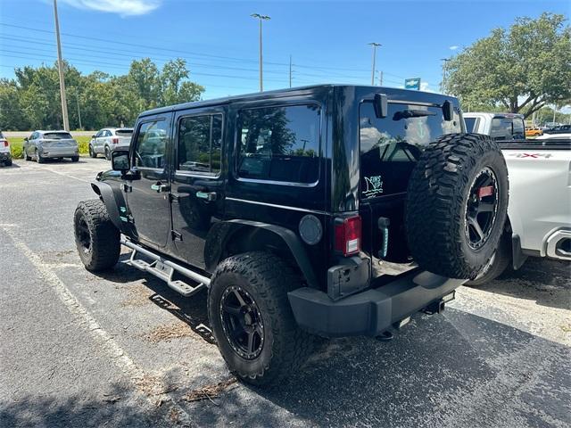 used 2014 Jeep Wrangler Unlimited car, priced at $15,977