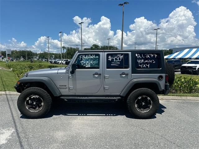 used 2016 Jeep Wrangler Unlimited car, priced at $21,977