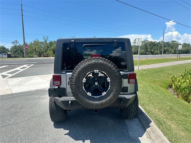 used 2016 Jeep Wrangler Unlimited car, priced at $21,977