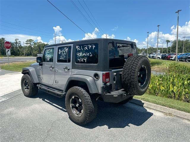 used 2016 Jeep Wrangler Unlimited car, priced at $21,977