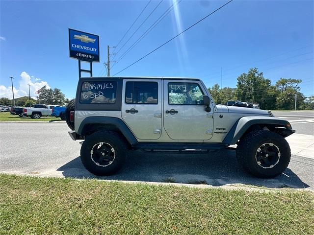 used 2016 Jeep Wrangler Unlimited car, priced at $21,977