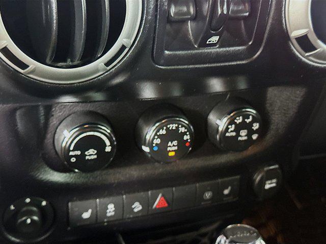 used 2015 Jeep Wrangler Unlimited car, priced at $19,399