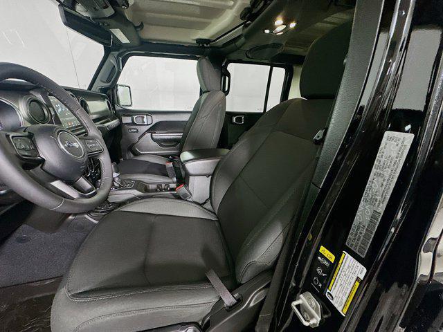 used 2023 Jeep Wrangler 4xe car, priced at $30,497