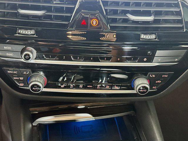 used 2023 BMW 530e car, priced at $30,697
