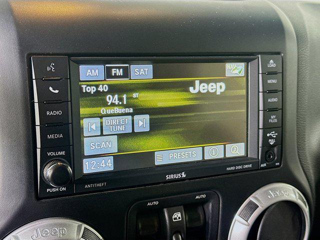 used 2014 Jeep Wrangler Unlimited car, priced at $16,299