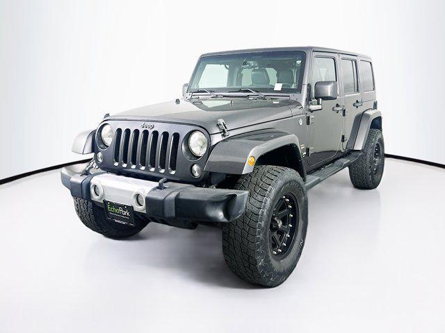 used 2014 Jeep Wrangler Unlimited car, priced at $16,299