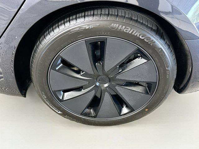 used 2024 Tesla Model 3 car, priced at $31,497