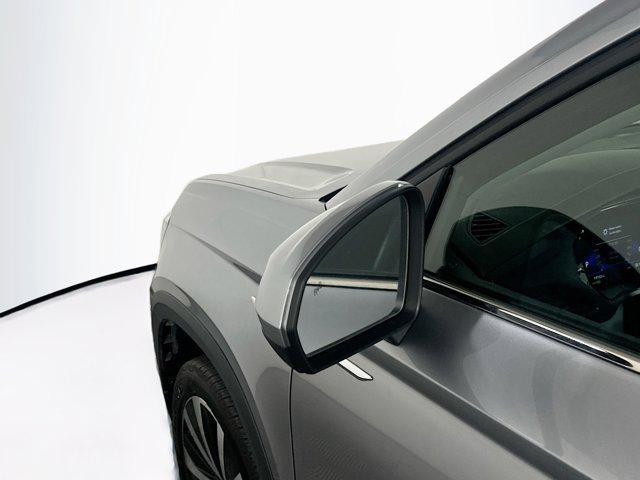 used 2024 Volkswagen Taos car, priced at $22,497