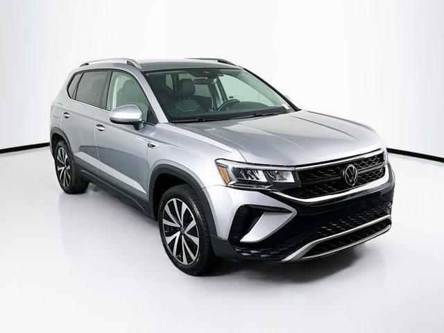 used 2024 Volkswagen Taos car, priced at $20,397