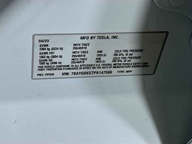 used 2023 Tesla Model Y car, priced at $30,799
