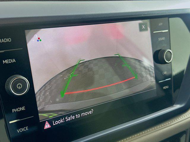 used 2024 Volkswagen Taos car, priced at $18,997