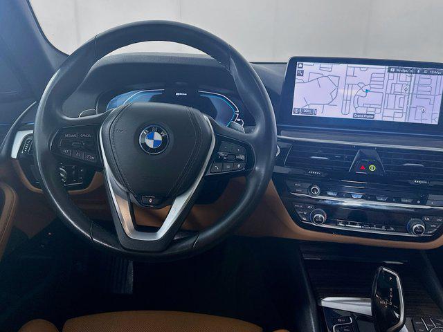 used 2023 BMW 530e car, priced at $31,597