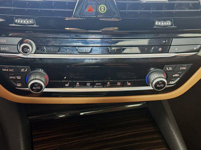 used 2023 BMW 530e car, priced at $31,597