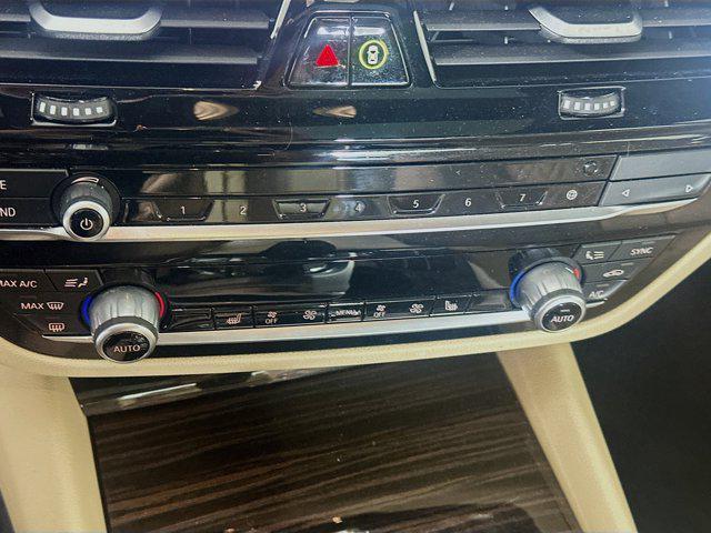 used 2023 BMW 530e car, priced at $31,597