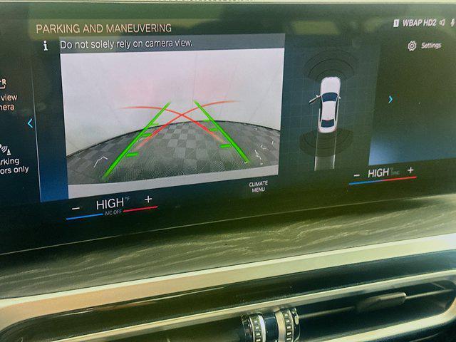 used 2024 BMW 330e car, priced at $27,347