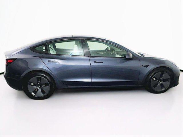 used 2023 Tesla Model 3 car, priced at $25,697